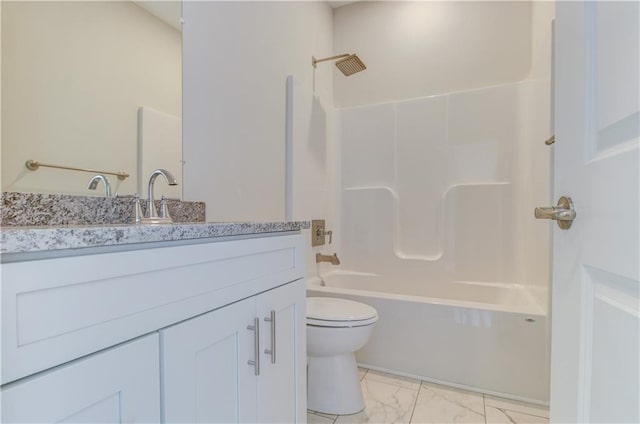 1828 N 92nd Ter, Kansas City, KS 66112 - full bath with marble finish floor, toilet, vanity, and washtub / shower combination
