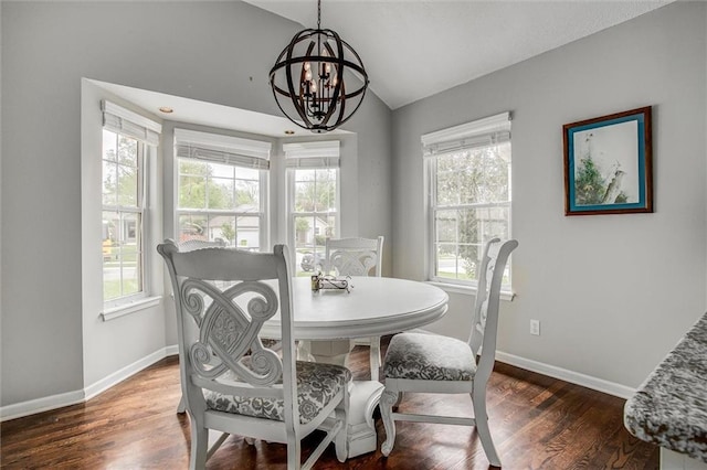 3204 SW Alice Ln, Lees Summit, MO 64082 - dining room with baseboards, vaulted ceiling, dark wood finished floors, and a chandelier