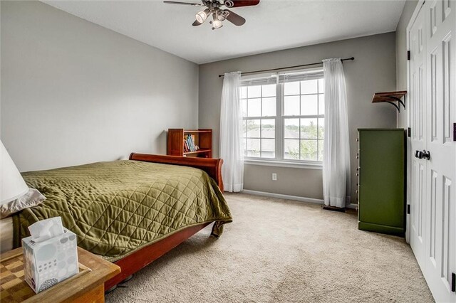 3204 SW Alice Ln, Lees Summit, MO 64082 - bedroom featuring baseboards, carpet flooring, and ceiling fan