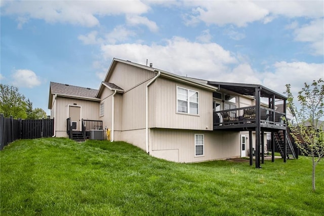 3204 SW Alice Ln, Lees Summit, MO 64082 - rear view of property featuring stairs, a lawn, fence, and a deck