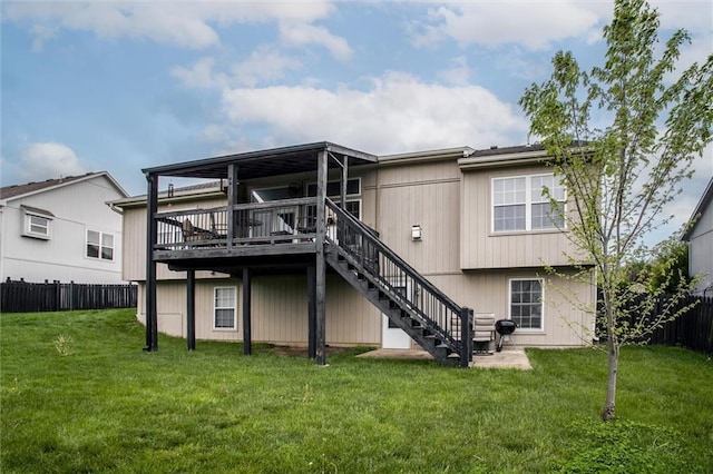 3204 SW Alice Ln, Lees Summit, MO 64082 - rear view of house with fence, stairs, a yard, and a wooden deck