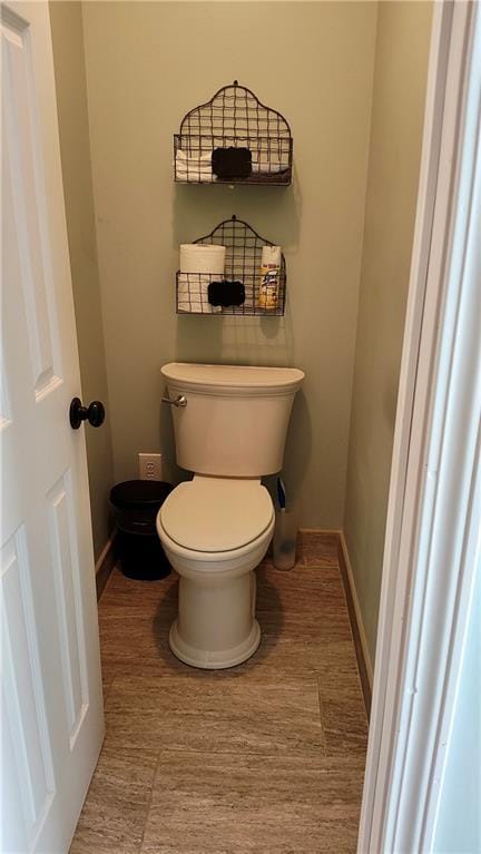 3204 SW Alice Ln, Lees Summit, MO 64082 - bathroom featuring baseboards and toilet