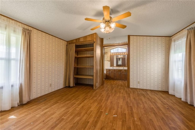 20 SE E Hwy, Trenton, MO 64683 - unfurnished bedroom with wood finished floors and a textured ceiling