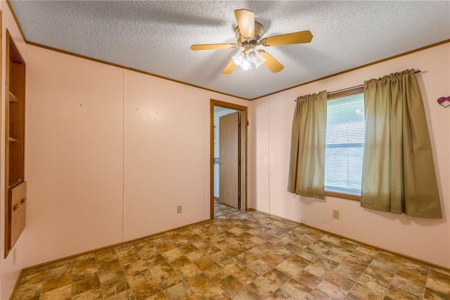 20 SE E Hwy, Trenton, MO 64683 - empty room featuring crown molding, a textured ceiling, ceiling fan, and stone finish flooring
