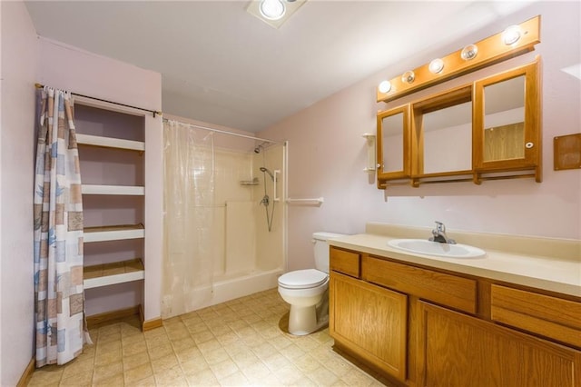 20 SE E Hwy, Trenton, MO 64683 - bathroom featuring vanity, a shower with shower curtain, and toilet