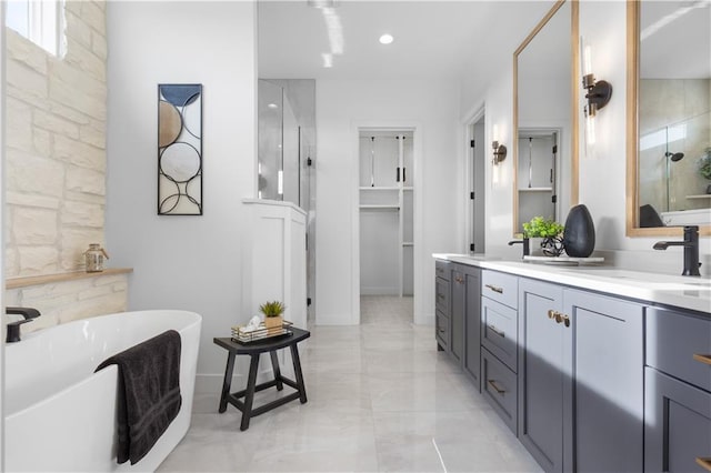 14511 S Dawson St, Olathe, KS 66061 - bathroom with a shower stall, double vanity, a soaking tub, marble finish flooring, and recessed lighting