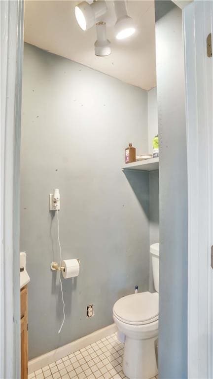812 Pacific Ave, Osawatomie, KS 66064 - bathroom with vanity and tile patterned floors
