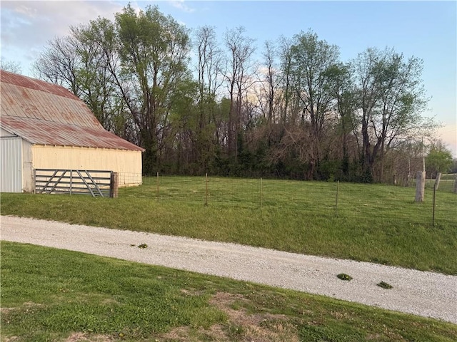 view of yard with an outdoor structure and an outbuilding