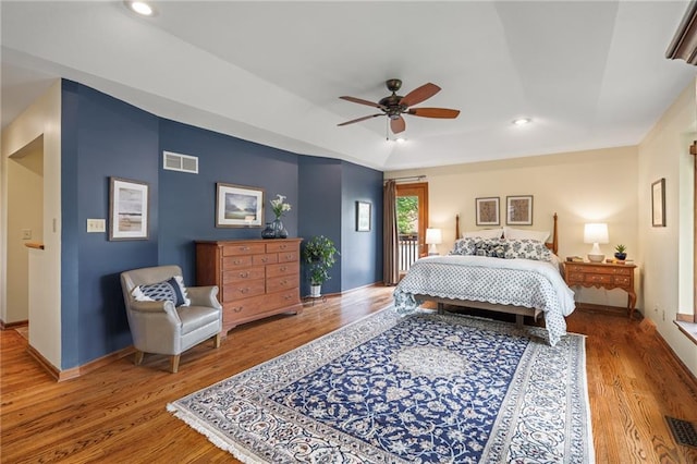 bedroom featuring wood finished floors, recessed lighting, baseboards, and ceiling fan