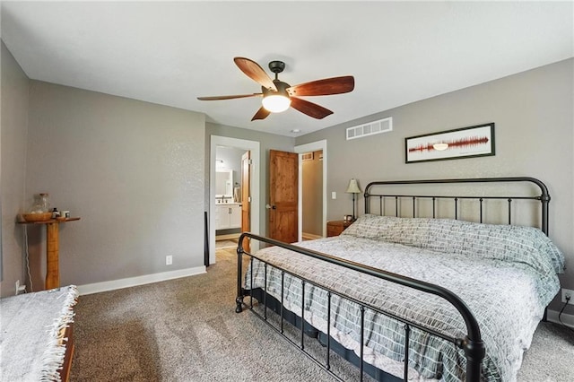 carpeted bedroom with baseboards, ceiling fan, and visible vents