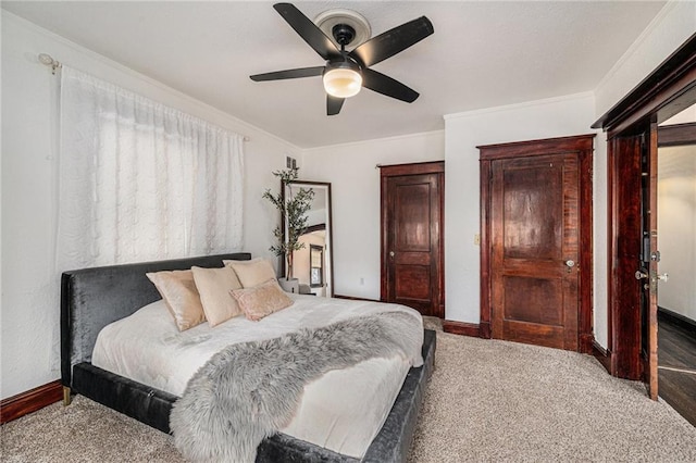 525 W 38th St, Kansas City, MO 64111 - carpeted bedroom featuring baseboards, crown molding, and a ceiling fan
