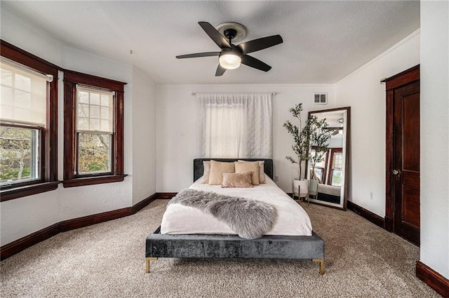 525 W 38th St, Kansas City, MO 64111 - bedroom featuring carpet, baseboards, ornamental molding, a ceiling fan, and a textured ceiling