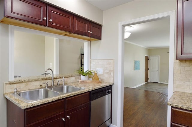 464 W 104th St Unit A, Kansas City, MO 64114 - kitchen with dark wood finished floors, dishwasher, reddish brown cabinets, a sink, and decorative backsplash