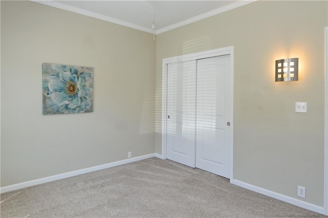 464 W 104th St Unit A, Kansas City, MO 64114 - unfurnished bedroom featuring baseboards, crown molding, carpet flooring, and a closet