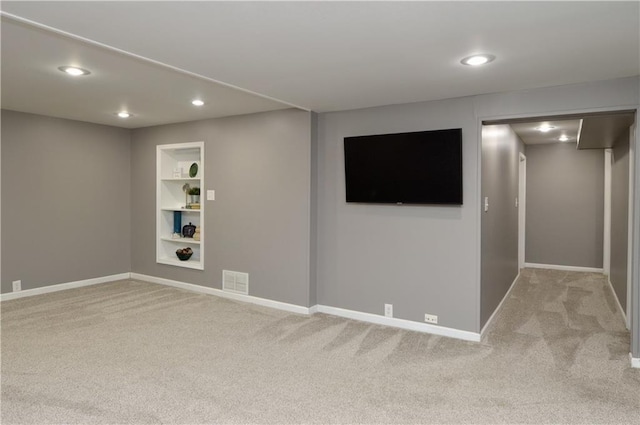 464 W 104th St Unit A, Kansas City, MO 64114 - basement featuring carpet flooring, recessed lighting, and built in features