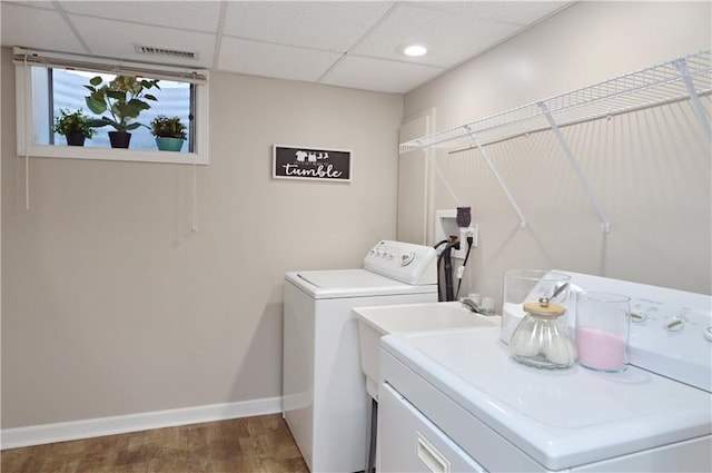 464 W 104th St Unit A, Kansas City, MO 64114 - laundry area featuring baseboards, recessed lighting, wood finished floors, washer and dryer, and laundry area