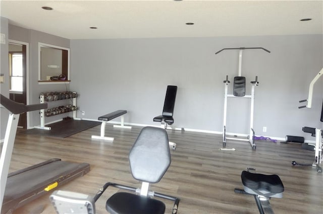 464 W 104th St Unit A, Kansas City, MO 64114 - workout room featuring wood finished floors and baseboards