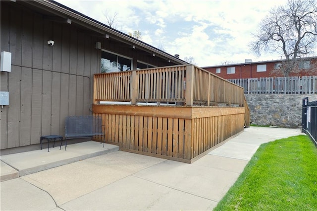 464 W 104th St Unit A, Kansas City, MO 64114 - wooden deck with fence and a patio