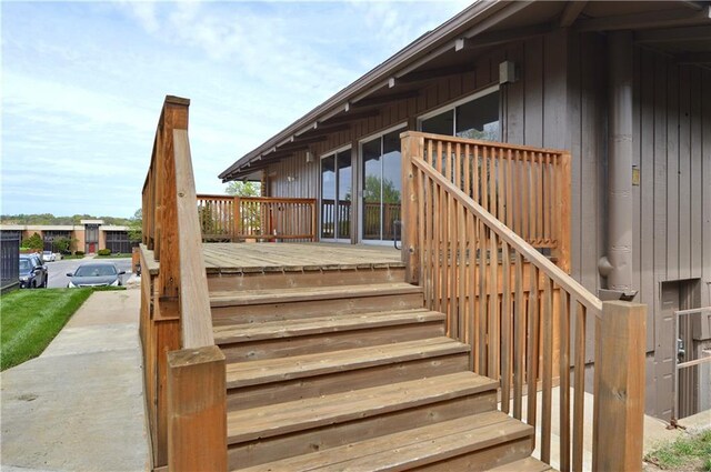464 W 104th St Unit A, Kansas City, MO 64114 - deck featuring stairs
