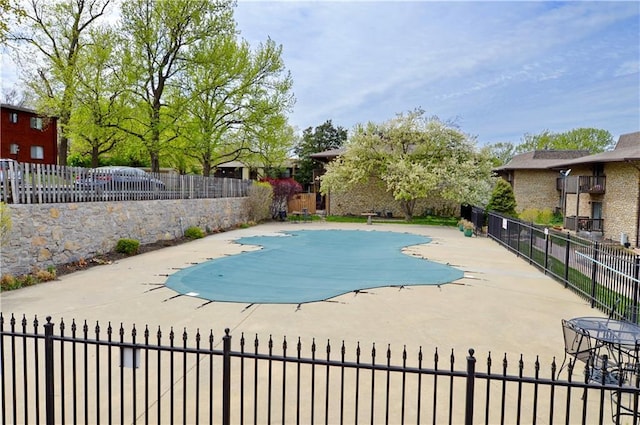 464 W 104th St Unit A, Kansas City, MO 64114 - view of pool with fence, a patio, and a fenced in pool