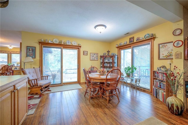 31025 203rd St, Leavenworth, KS 66048 - dining area with wood-type flooring and visible vents