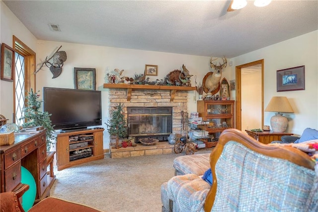 31025 203rd St, Leavenworth, KS 66048 - carpeted living room with visible vents and a stone fireplace