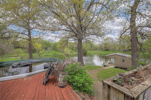 31025 203rd St, Leavenworth, KS 66048 - wooden deck with an outdoor structure and a water view