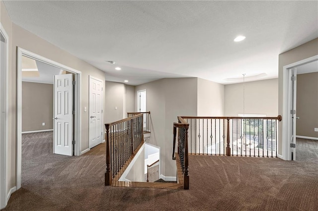5108 W 150th St, Leawood, KS 66224 - hallway with carpet flooring, an upstairs landing, and recessed lighting