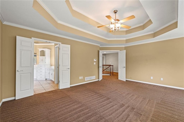 5108 W 150th St, Leawood, KS 66224 - unfurnished room with ceiling fan, light carpet, crown molding, and a tray ceiling