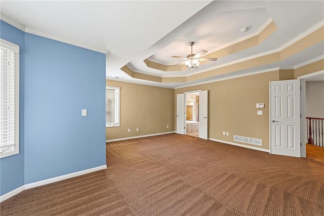 5108 W 150th St, Leawood, KS 66224 - unfurnished room featuring crown molding, carpet floors, a raised ceiling, ceiling fan, and a smoke detector