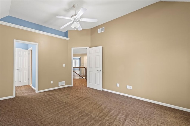 5108 W 150th St, Leawood, KS 66224 - unfurnished bedroom with carpet, vaulted ceiling, and a ceiling fan