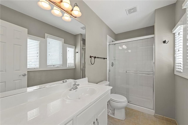 5108 W 150th St, Leawood, KS 66224 - bathroom featuring vanity, a shower stall, and tile patterned flooring