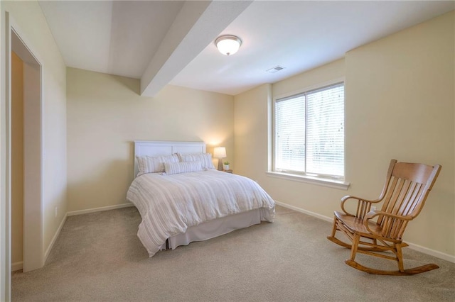 bedroom featuring carpet floors, baseboards, and visible vents
