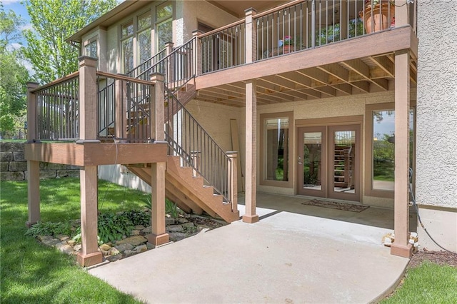 view of patio / terrace featuring stairs