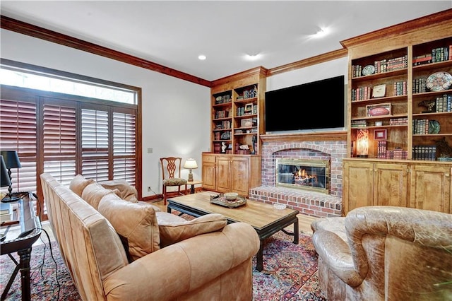 11405 Manor St, Leawood, KS 66211 - living area with crown molding, baseboards, a fireplace, built in shelves, and recessed lighting