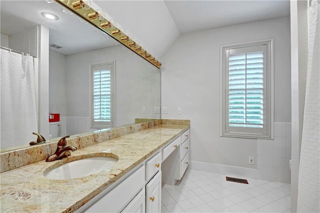 11405 Manor St, Leawood, KS 66211 - full bath featuring tile patterned flooring, vanity, and baseboards