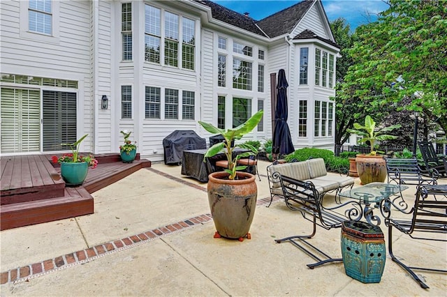 11405 Manor St, Leawood, KS 66211 - view of patio with grilling area and a wooden deck