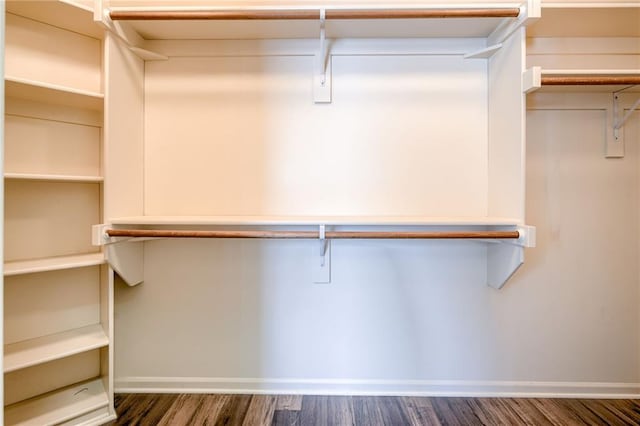 496 S 137th St, Bonner Springs, KS 66012 - spacious closet featuring dark wood finished floors