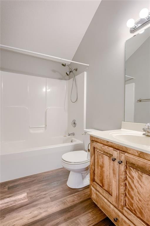 496 S 137th St, Bonner Springs, KS 66012 - full bathroom featuring toilet, wood finished floors, shower / bathtub combination, and vanity