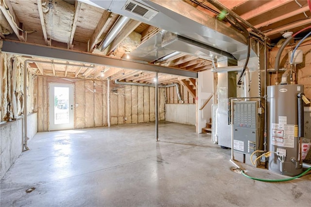 496 S 137th St, Bonner Springs, KS 66012 - basement featuring water heater, stairway, and heating unit
