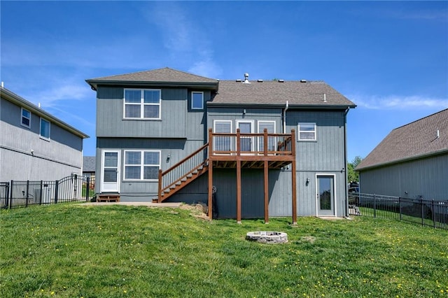 496 S 137th St, Bonner Springs, KS 66012 - back of property with a wooden deck, stairs, and an outdoor fire pit
