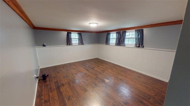 11706 W 69th St, Shawnee, KS 66203 - spare room with wood-type flooring, crown molding, and a wainscoted wall