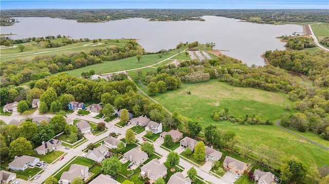 birds eye view of property featuring a residential view and a water view
