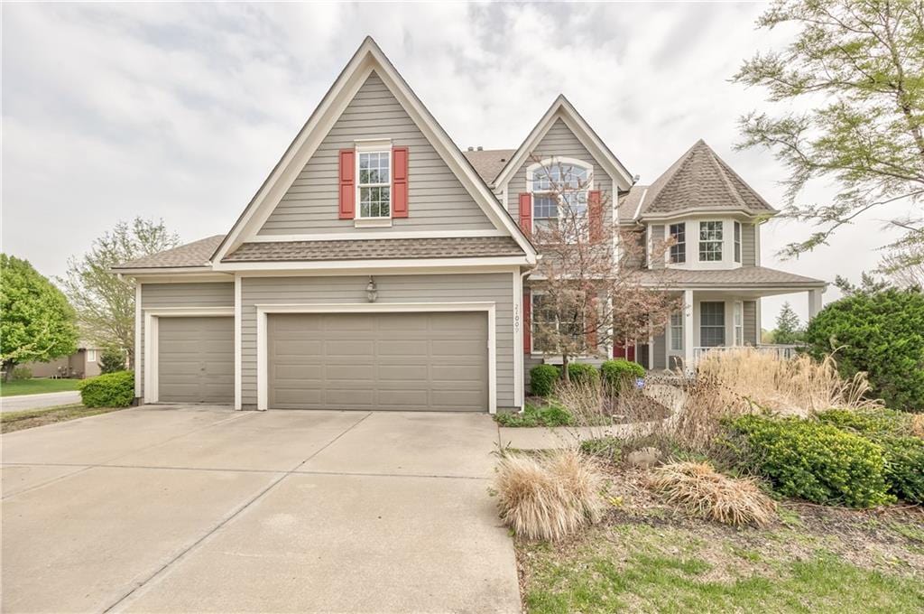 21009 W 81st Ter, Lenexa, KS 66220 - craftsman-style home with driveway