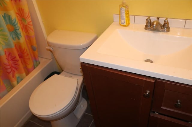 full bathroom with shower / bath combo, vanity, and toilet