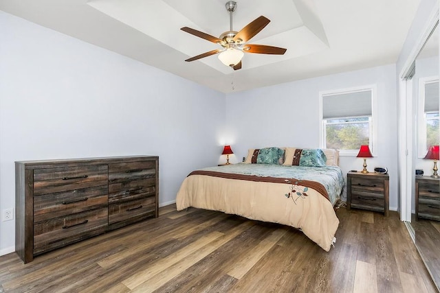 34701 E 235th St, Pleasant Hill, MO 64080 - bedroom with a raised ceiling, baseboards, a ceiling fan, and wood finished floors