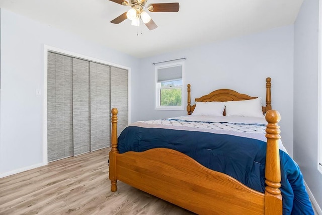 34701 E 235th St, Pleasant Hill, MO 64080 - bedroom featuring light wood-type flooring, baseboards, ceiling fan, and a closet