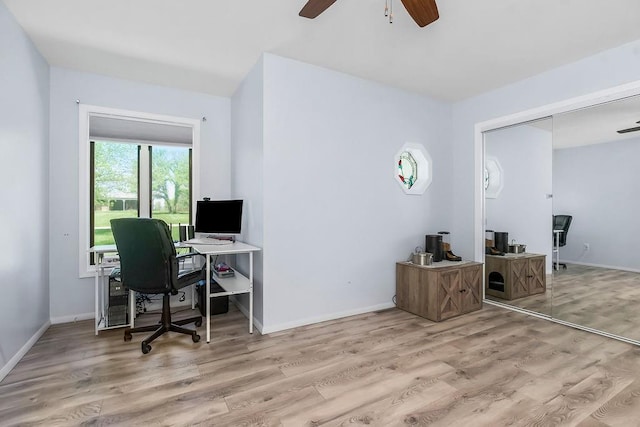 34701 E 235th St, Pleasant Hill, MO 64080 - home office with baseboards, ceiling fan, and wood finished floors
