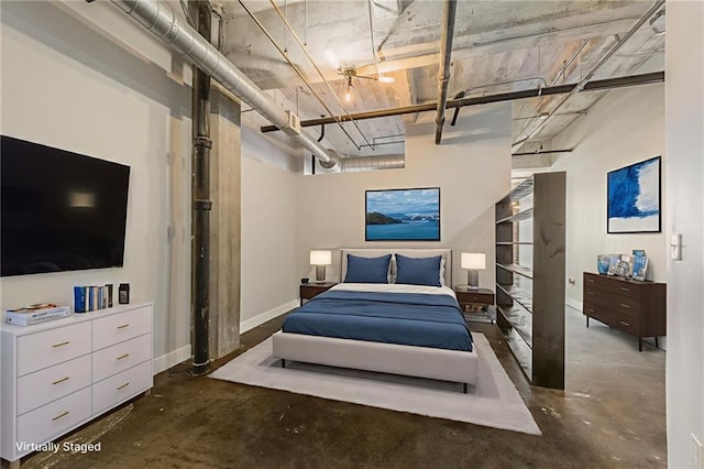 715 May St Unit 328, Kansas City, MO 64105 - bedroom featuring unfinished concrete flooring and baseboards