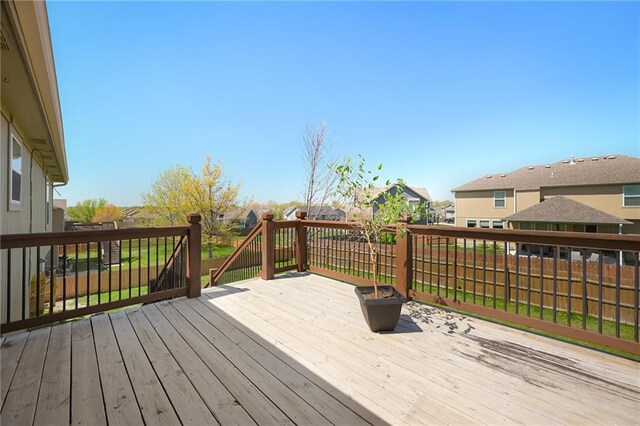12304 White Oak St, Peculiar, MO 64078 - wooden terrace with a residential view